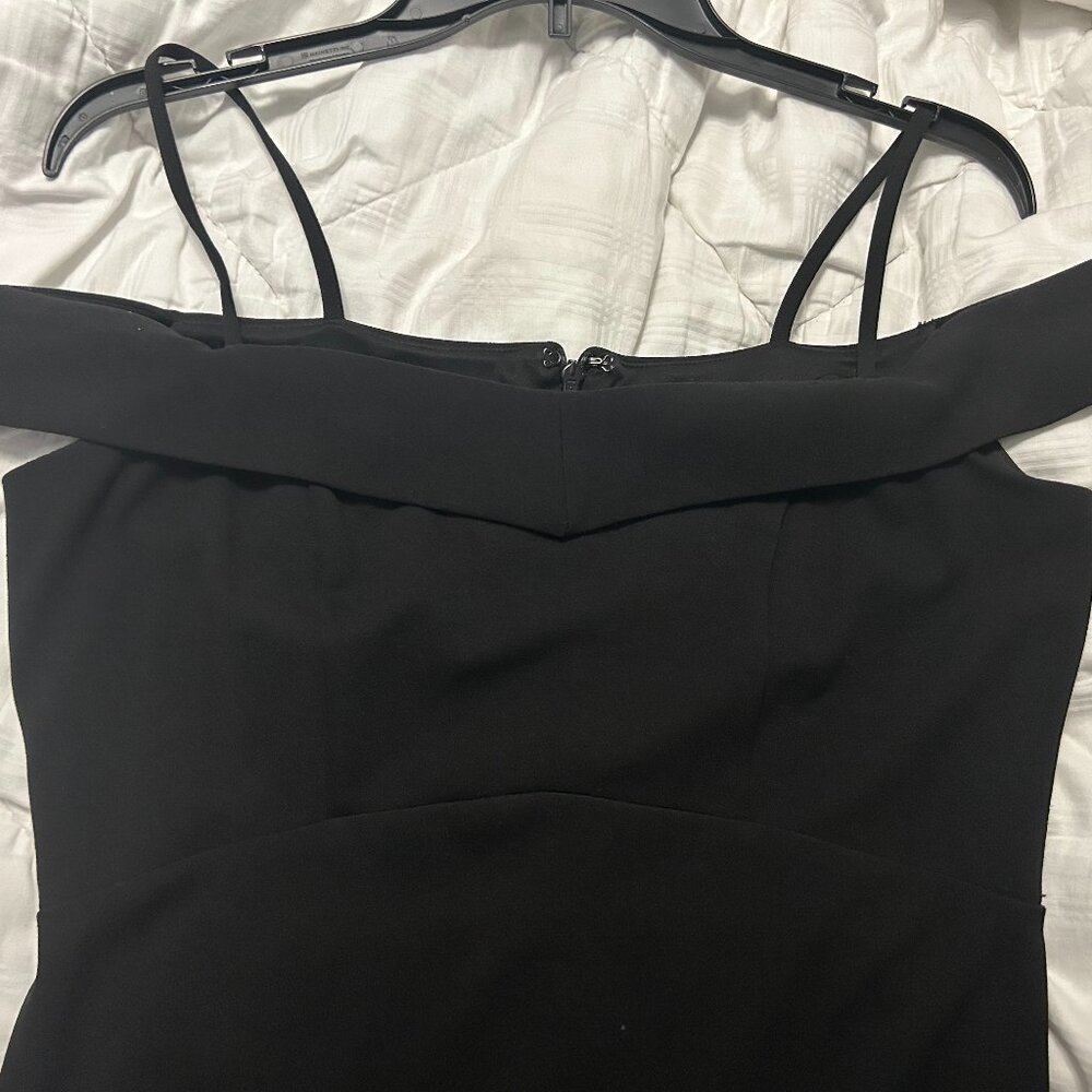 BEBE, elegant silhouette, black dress